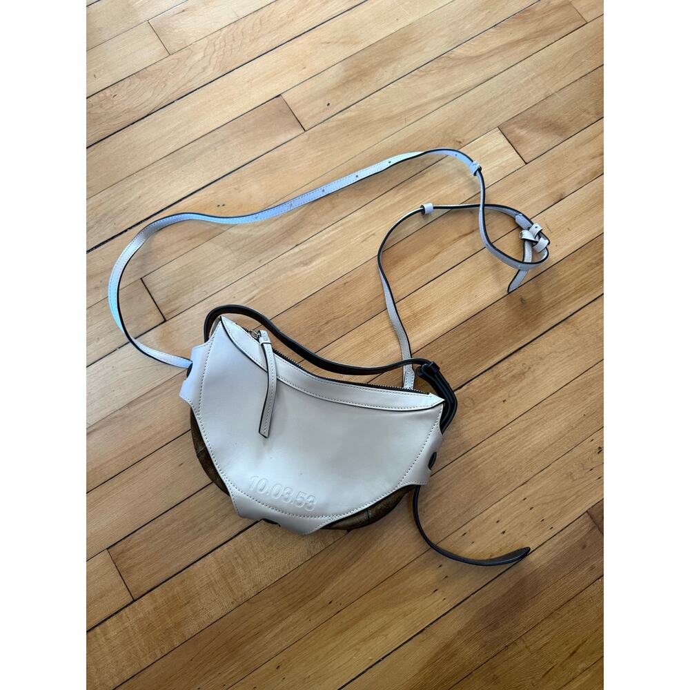 10.03.53 crossbody half moon cream colored bag